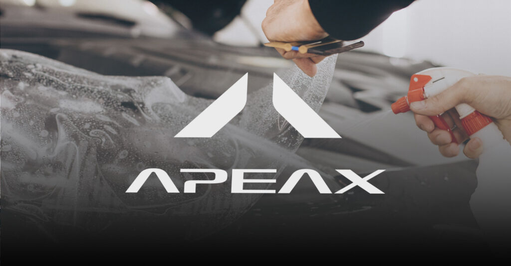 A car is wrapped by Apeax PPF with a logo of Apeax