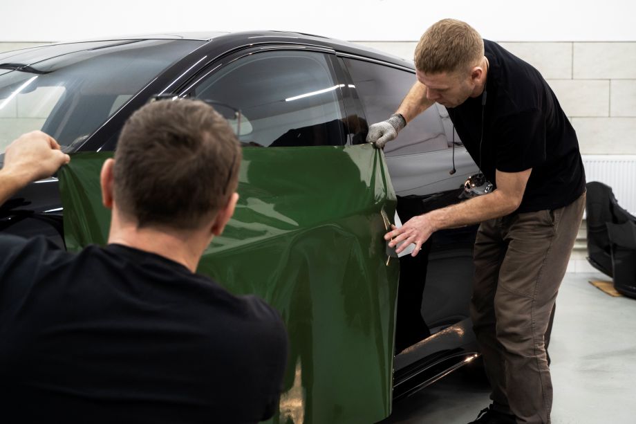 person working car wrapping